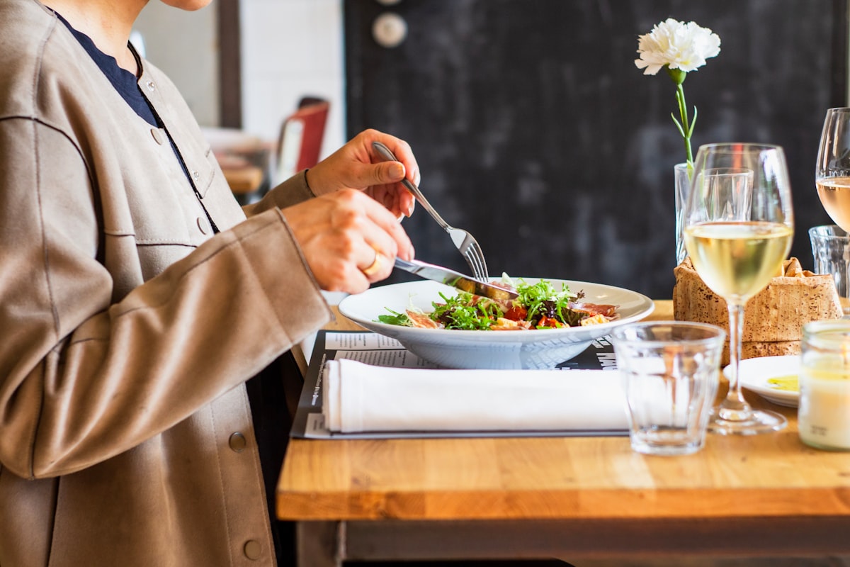 Nutritionist planning a balanced meal with fresh vegetables and whole grains